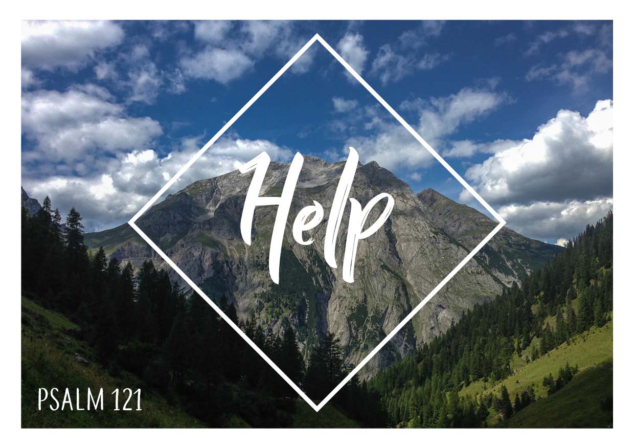 Photo of a large mountain. In the foreground are slopes with trees and meadows. The text on the picture reads “Help” and the text “Psalm 121”